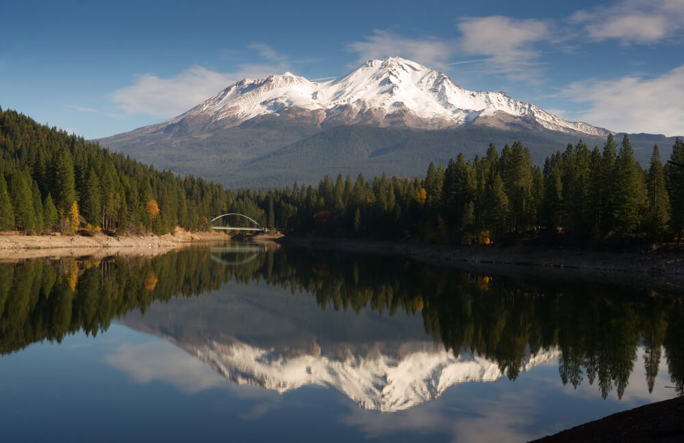 where it snows in California Mt Shasta Reflection Mountain Lake Modest Bridge California Recreation Landscape