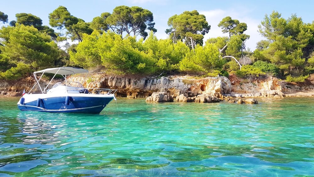 Boat and landscape in the Sainte Marguerite island, Lerins islands, South of France (1)