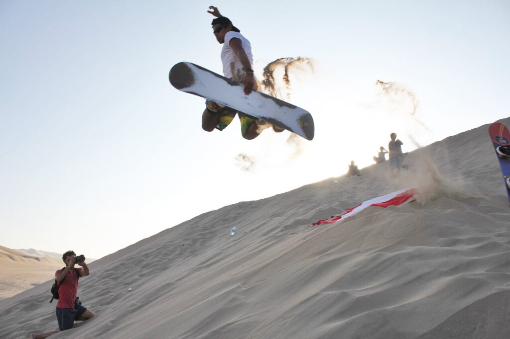 things to do in huacachina - Sandboarding in Huacachina