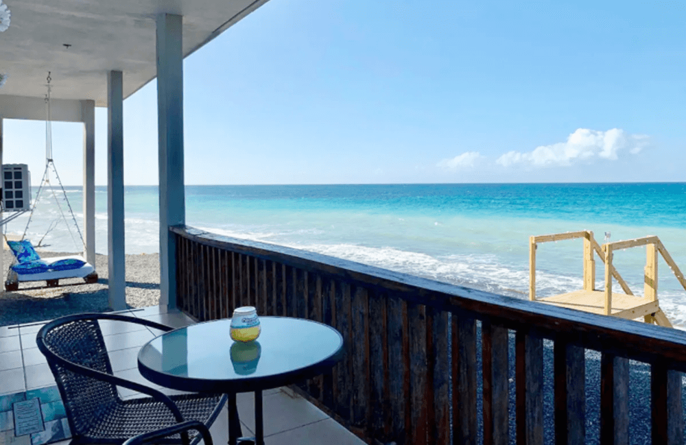 airbnbs in puerto rico Waves and sand sunset paradise!! oceanfront apt