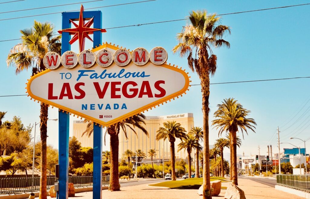 girls' trip to Las Vegas welcome to fabulous las vegas sign