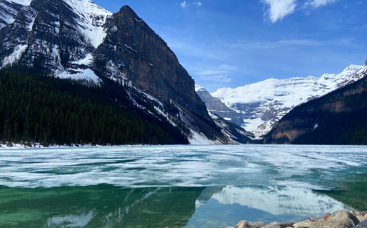 Banff to Glacier National Park lake louise half frozen